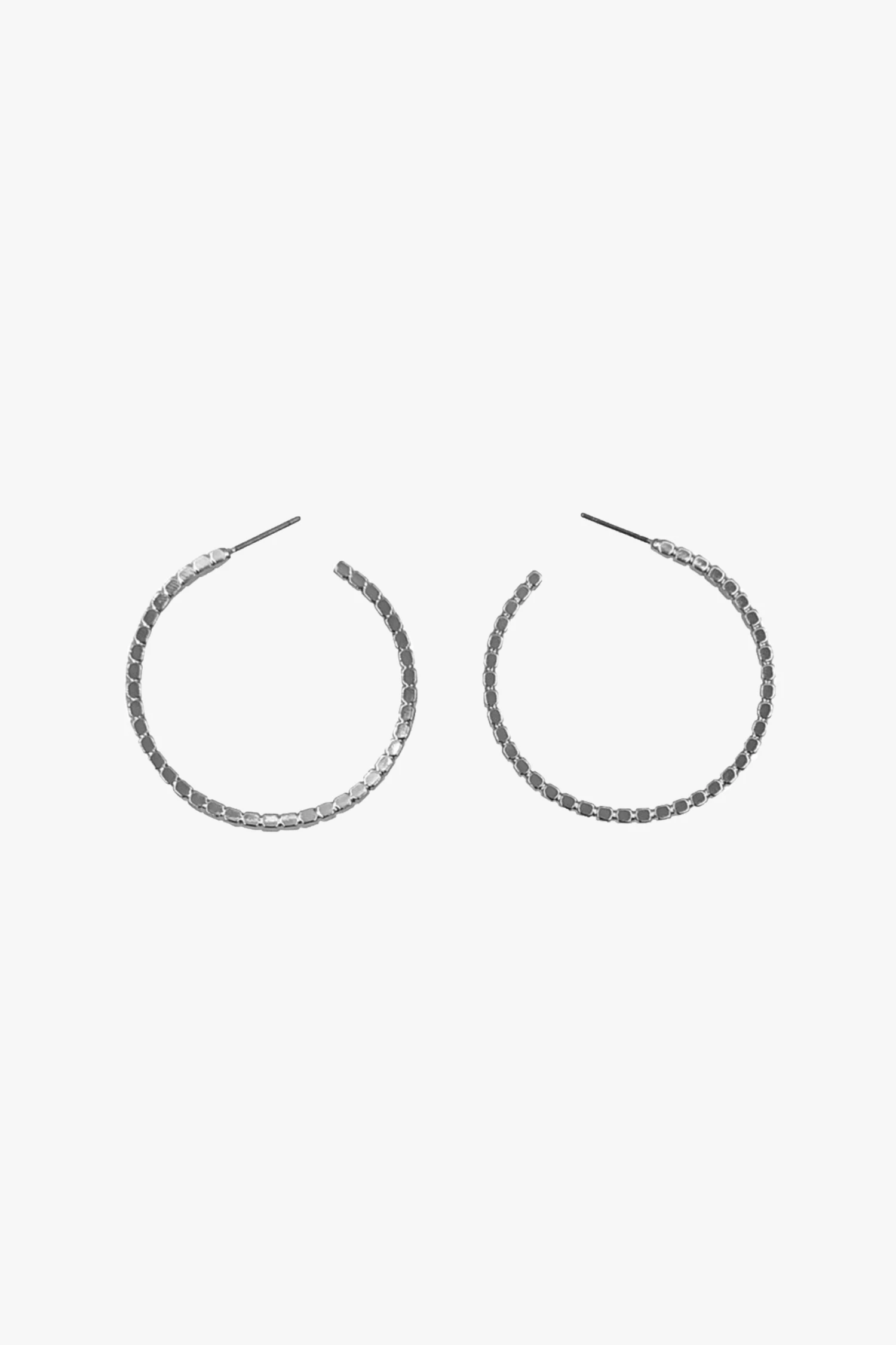 Flo Gives Back 15% To Women In Need Textured Thin Hoop Earrings Rhodium