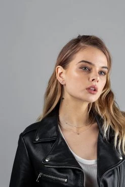 Stolen Support Local Falling Cross Earrings