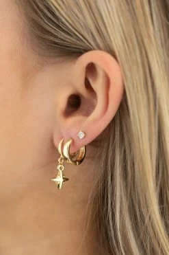 Flo Gives Back Jewellery The Northern Star Huggie Gold Hoop Earrings